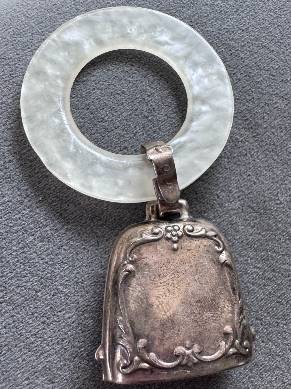 Sterling silver Antique Bell  with Frosted mother of pearl baby teething ring.